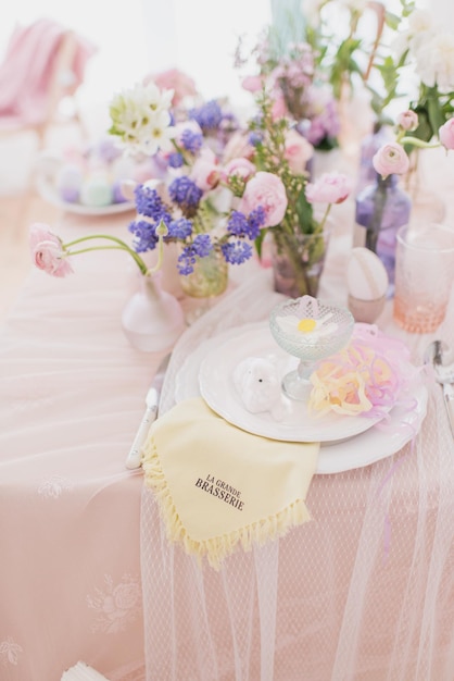 Easter decor, festive Easter table setting in pastel colors, spring holiday, wedding table