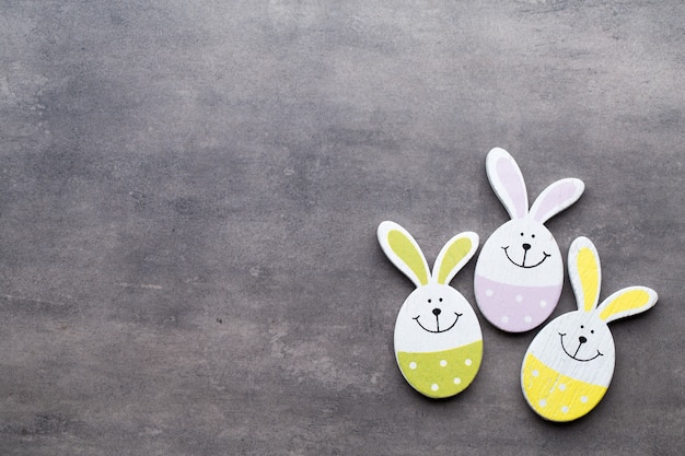 Easter decor on a wooden background. Pattern.