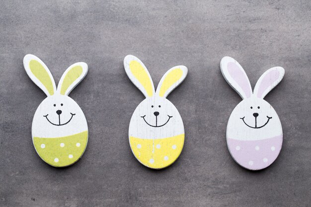 Easter decor on a wooden background. Pattern.