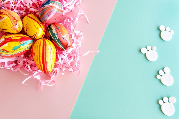 Easter decoration on pink and green background