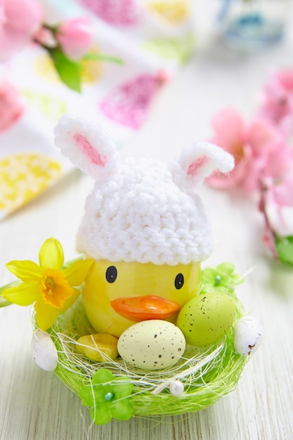 Easter decoration with little duck and eggs