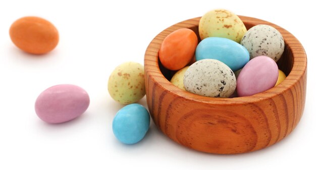 Easter egg in a bowl over white background