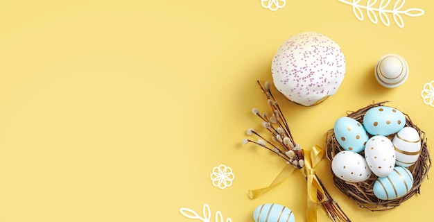 Easter egg and cake on grey table background