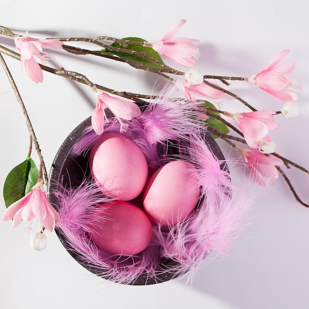 Easter eggs in a beautiful and simple composition with decorations