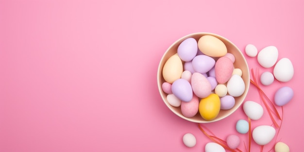 Easter eggs in a bowl on a pink background