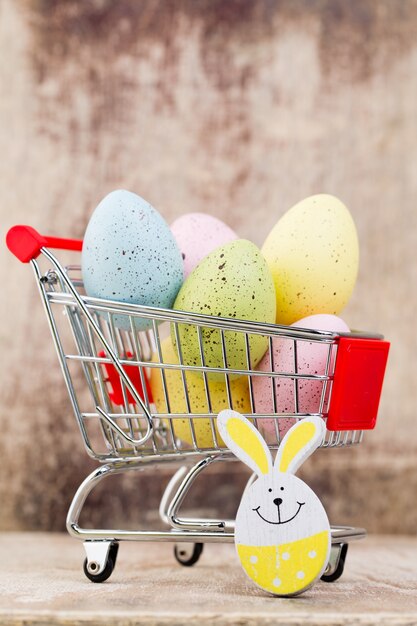 Photo easter eggs in the cart. spring discount card.