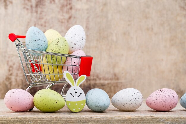 Photo easter eggs in the cart. spring discount card.