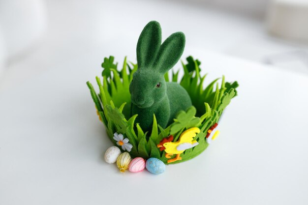 Easter eggs Chicken eggs twigs with green leaves on the hay Easter holiday concept background Copy space