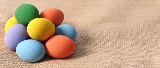 Easter eggs or color egg. Multi-colorful of easter eggs on background in studio with close-up shot which include many colour such as yellow, green, blue, purple, red on festival eggs by art painting.