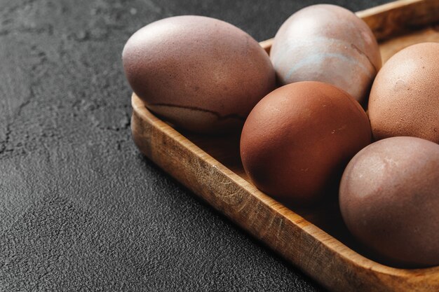 Easter eggs on a dark surface