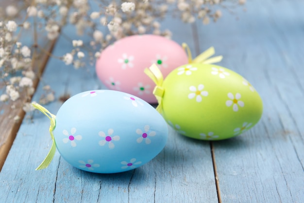 Easter eggs decoration on wooden background