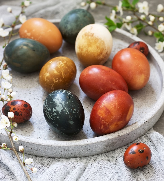 Easter eggs dyed with natural dyes, cabbage, chamomile, hibiscus and onion peel.