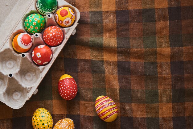 Easter eggs hand painted on wooden background