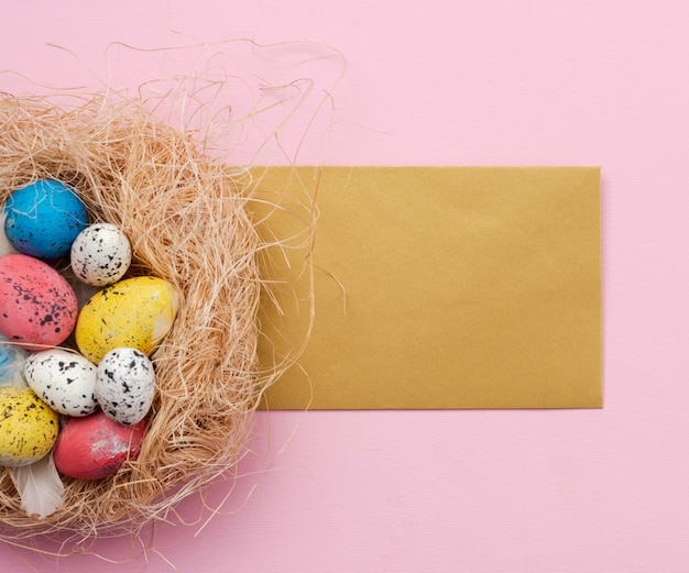 Easter eggs in nest and greetings card