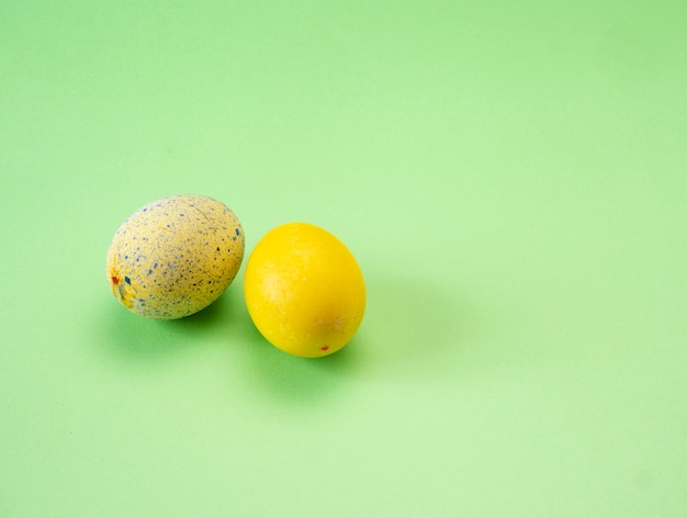 Easter eggs painted on green background 