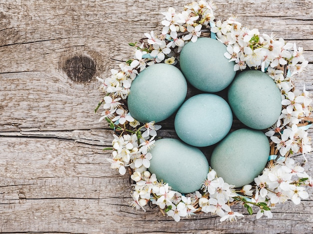 Easter eggs painted with colorful paints. View from above, no people, texture. Congratulations for loved ones, relatives, friends and colleagues