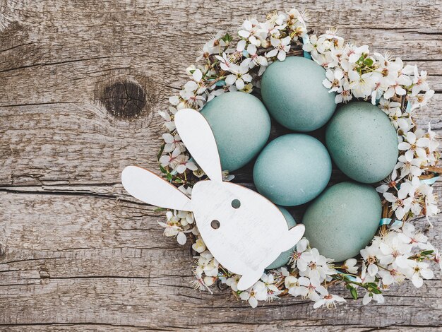 Easter eggs painted with colorful paints. View from above, no people, texture.