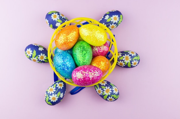 Easter eggs on pink background