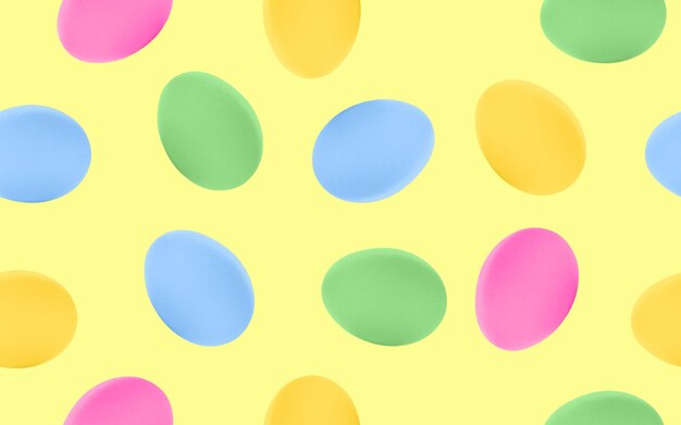 Easter eggs seamless pattern on yellow background