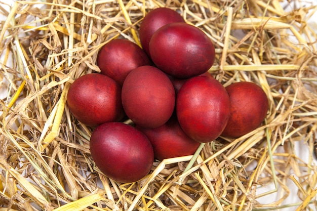 Easter eggs in a straw nest. Happy Easter!