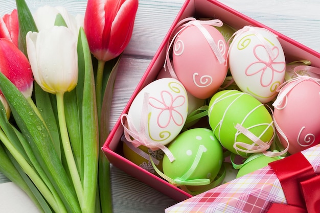 Easter eggs and tulips bouquet