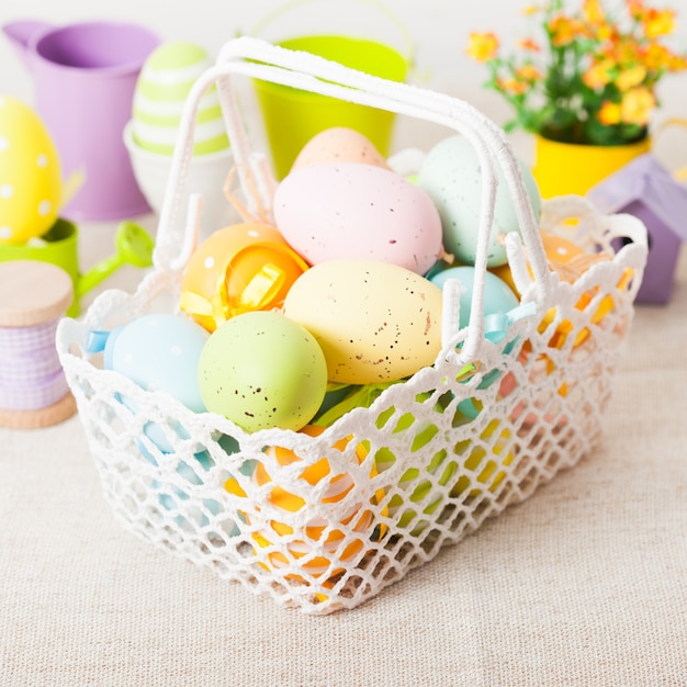 Easter eggs in the white crochet basket