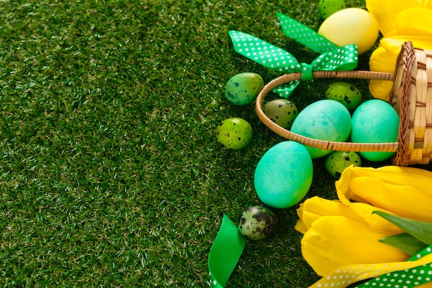 Easter Eggs with flower on Green Grass