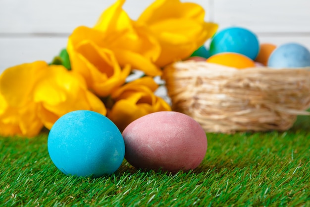 Easter Eggs with flower on Green Grass