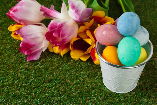 Easter Eggs with flower on Green Grass