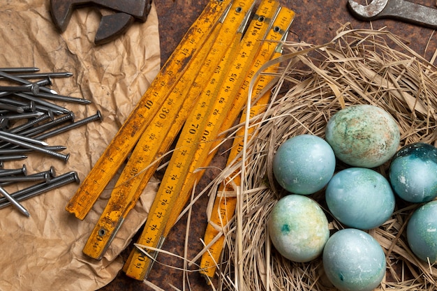 Easter eggs with old hands tools.