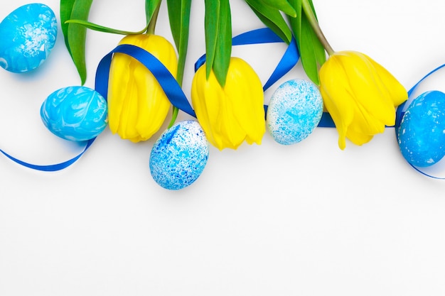 Easter eggs with tulips flowers