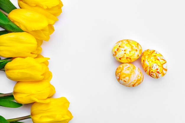 Easter eggs with tulips flowers