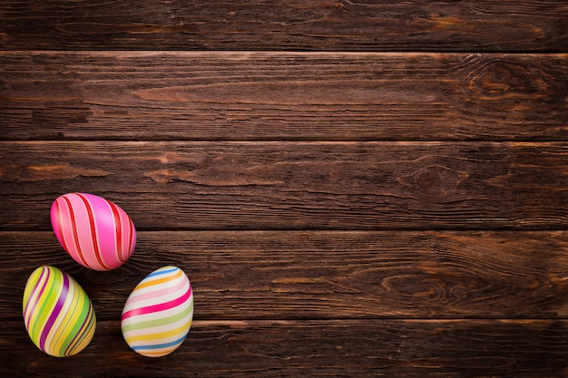 Easter eggs on wooden background. 3D rendering illustration.