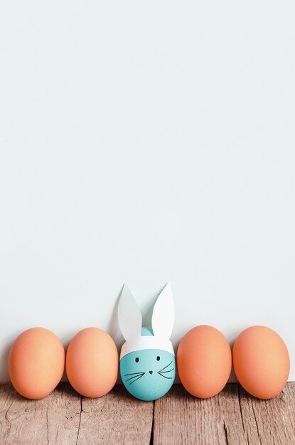 Easter eggs on wooden background.