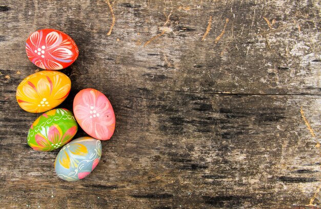 Easter eggs on the wooden background