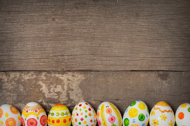 Easter eggs on wooden background