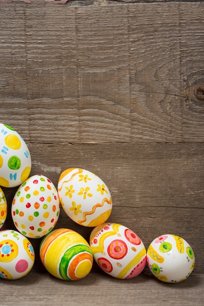 Easter eggs on wooden background