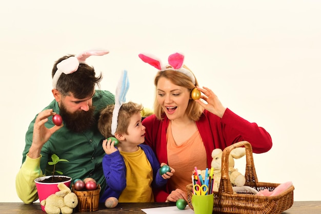 Easter family with color easter eggs on isolated background bunny ears and rabbit ears design