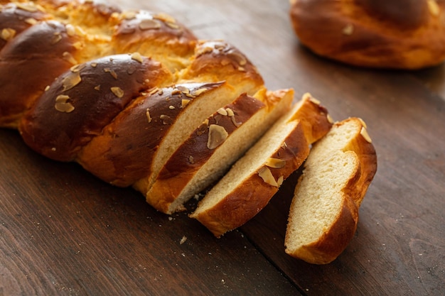 Easter greek tsoureki braid sweet bread brioche on wood