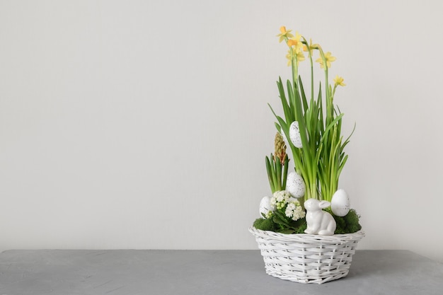 Easter handmade flower composition with blossom narcissus