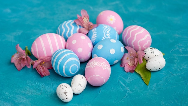 Easter holiday festive composition holiday decoration pink blue painted eggs with minimal modern