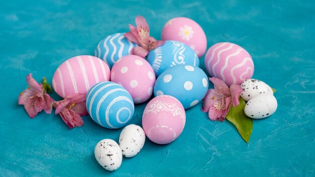 Easter holiday festive composition pink blue eggs