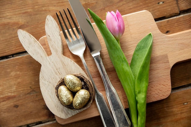 Easter holiday meal background easter bunny with eggs and spring flowers