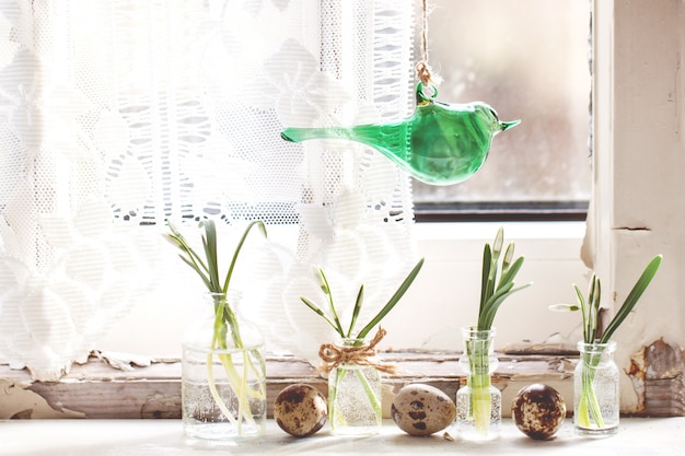 Easter interior with snowdrops and quail eggs