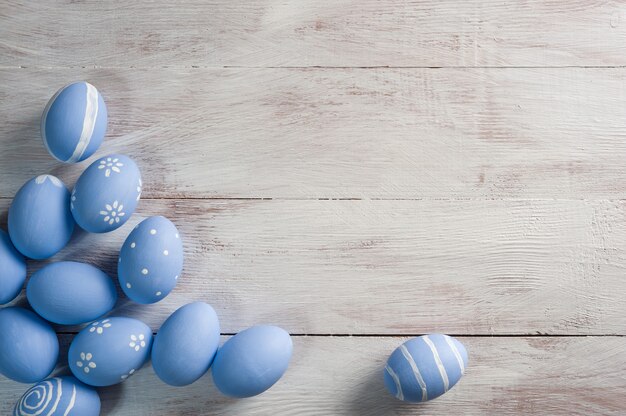 easter painted eggs on wooden table