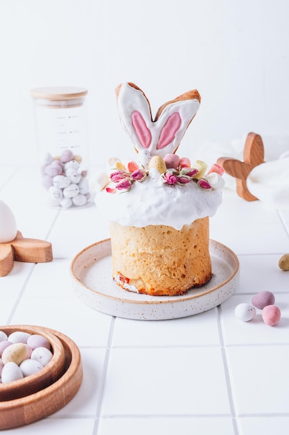 Easter panettone with bunny ears cookies mini chocolate eggs marshmallows and dry roses