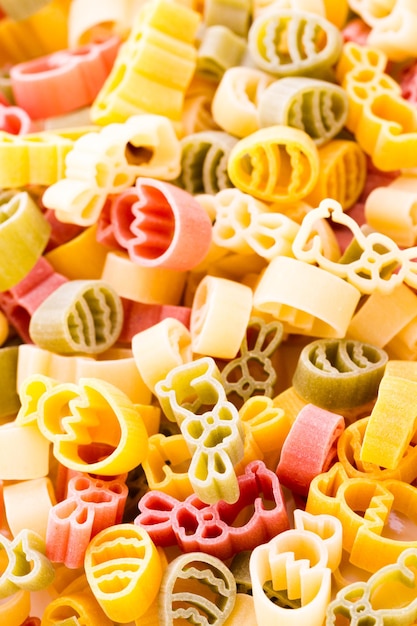 Easter pasta in yellow, red and green colors.