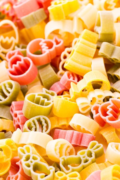 Easter pasta in yellow, red and green colors.