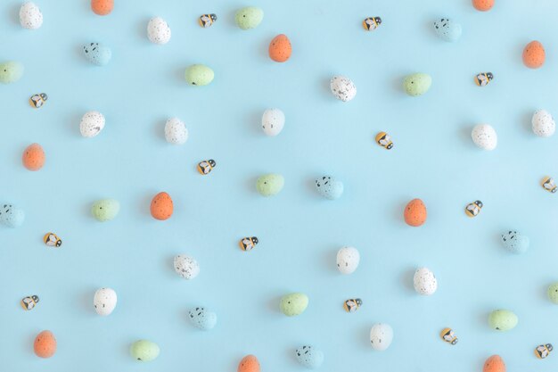 Easter pastel  eggs on blue background, spring concept