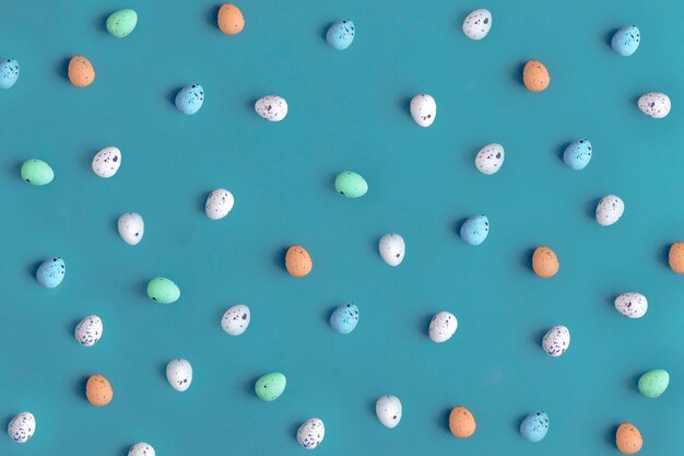 Easter pastel eggs on blue background, toning